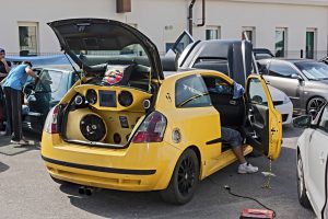 Borghi, RN, Italy - August 12, 2012: cpower music audio system - fans of tuned cars present extreme amplifiers and speakers at rally Fashion tuning club